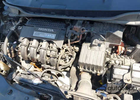 2013 Honda Insight from USA, damaged, VIN JHMZE2H31DS002352